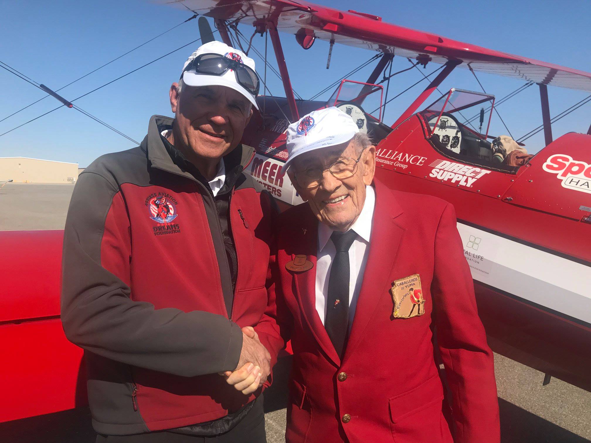 Two men shaking hands at Ageless Aviation